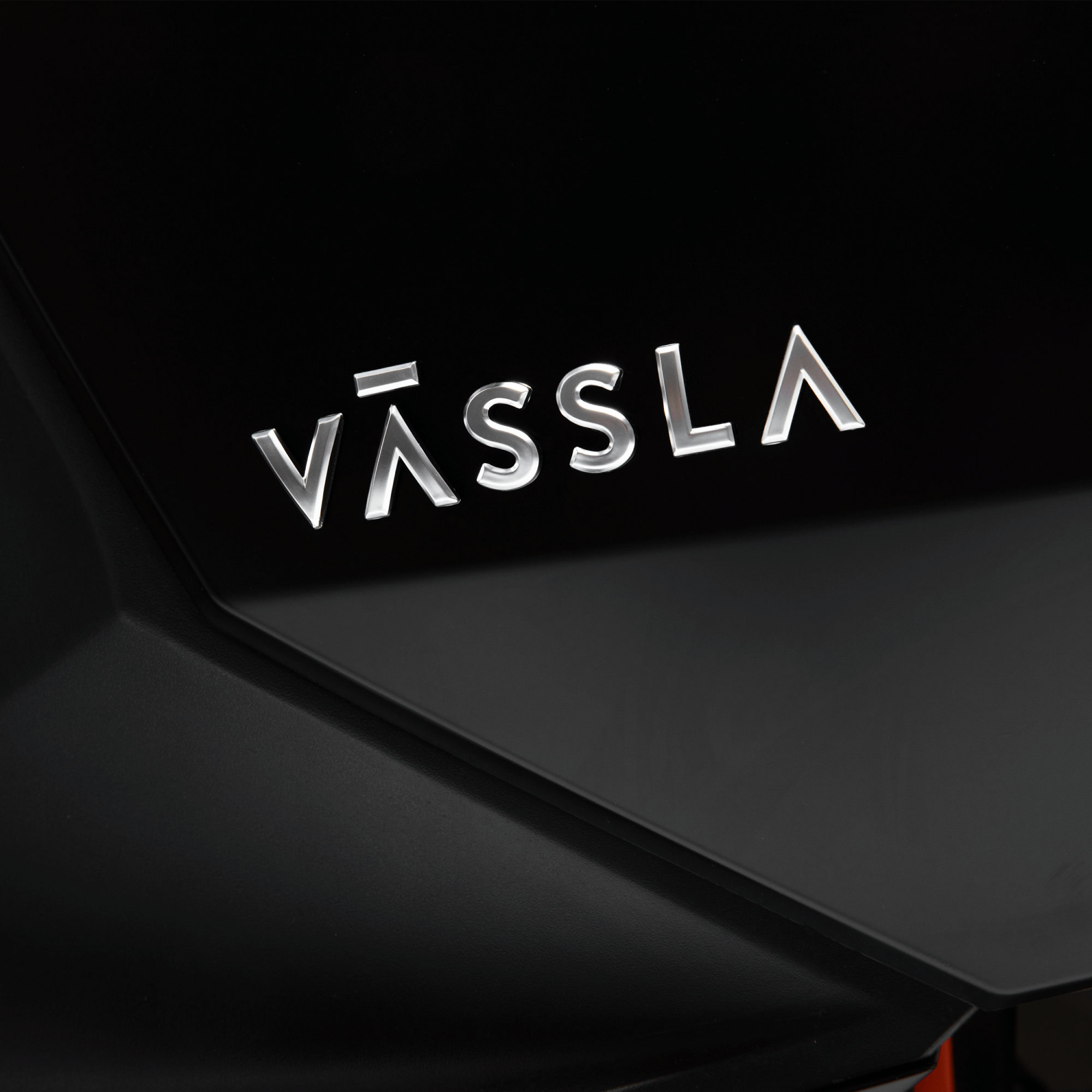 Vässla Side emblem pair